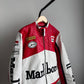 Vintage Marlboro leather jacket showing authentic racing sponsor patches including Michelin and Arai