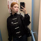 Women styling the oversized Black CNY Jacket in Tang style from Gigavibe
